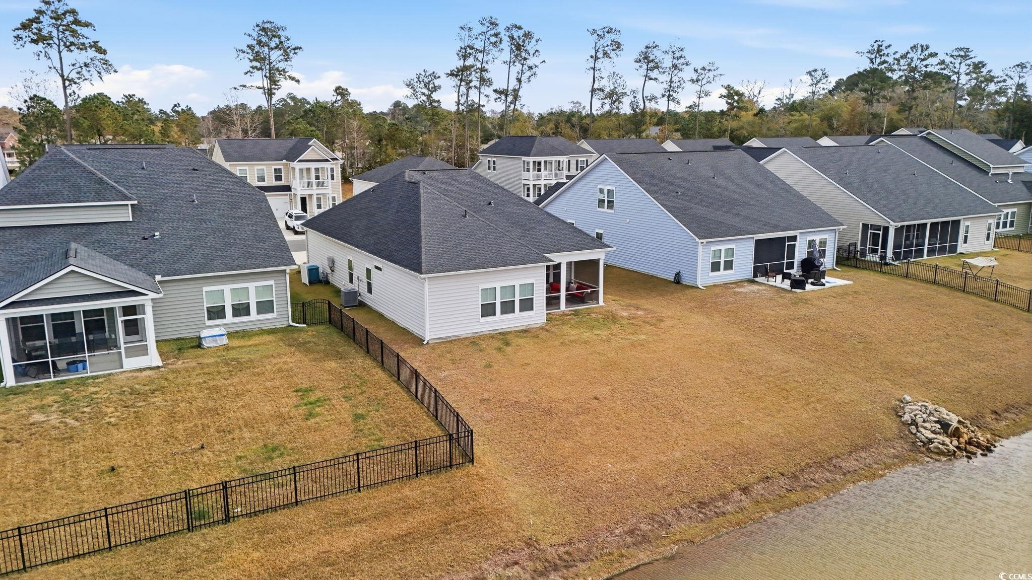 176 Empyrean Circle Myrtle Beach, SC 29588 - Photo 28 of 36 View of patio / terrace with a ceiling fan, an outdoor hangout area, and a water view