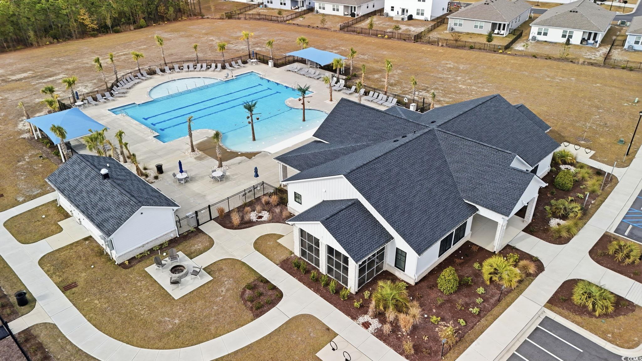 176 Empyrean Circle Myrtle Beach, SC 29588 - Photo 35 of 36 Aerial view of property and surrounding area featuring a nearby body of water and nearby suburban area