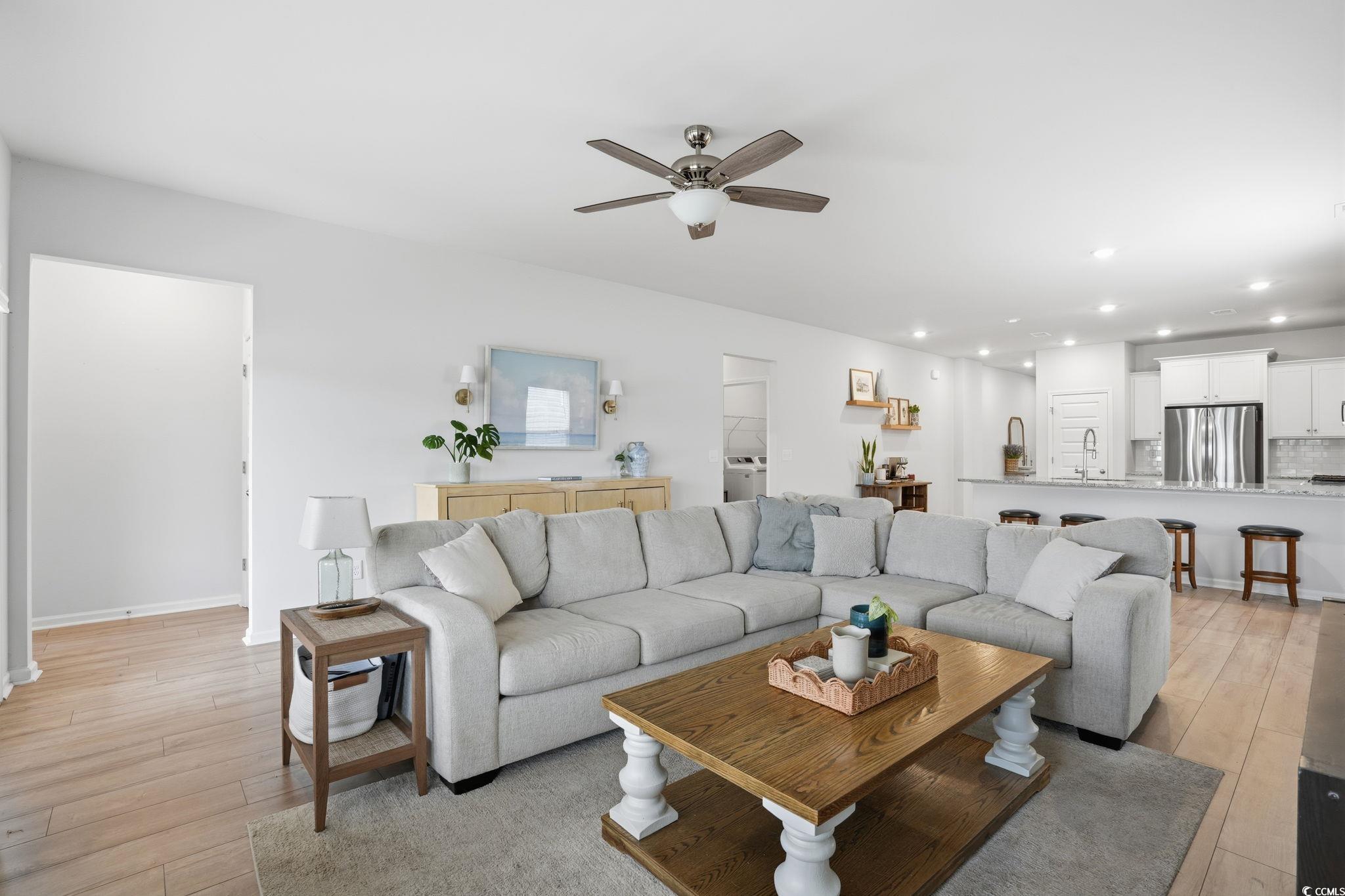 176 Empyrean Circle Myrtle Beach, SC 29588 - Photo 8 of 36 Living area with light wood-style floors, ceiling fan, and recessed lighting