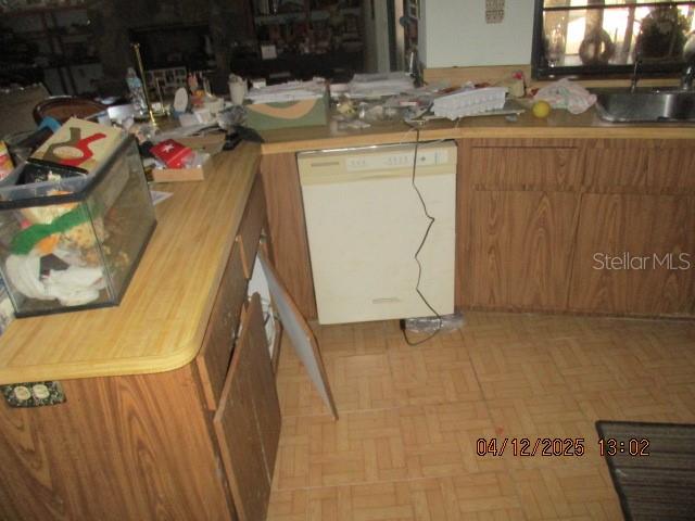 17849 Morninghigh Drive Lutz, FL 33549 - Photo 12 of 15 a utility room with dryer and washer