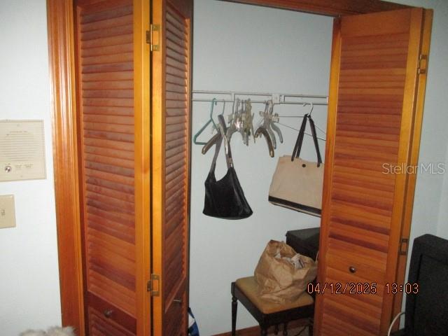 17849 Morninghigh Drive Lutz, FL 33549 - Photo 13 of 15 a room with a table and couches chair