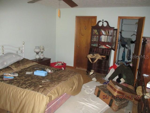 17849 Morninghigh Drive Lutz, FL 33549 - Photo 15 of 15 a bedroom with a bed and wooden floor