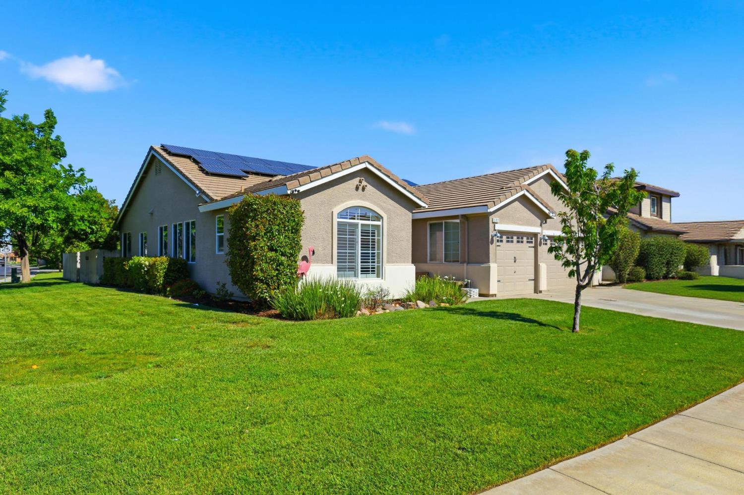 a view of a house with a big yard