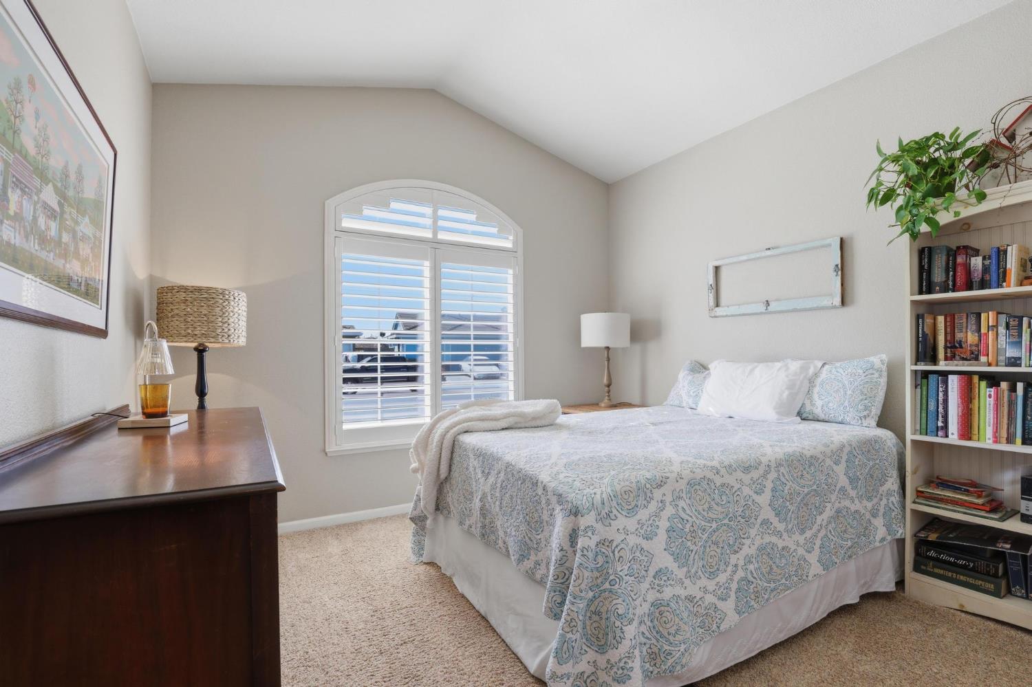 502 Waterfowl Way Williams, CA 95987 - Photo 11 of 51 a bedroom with a bed furniture and a book shelf