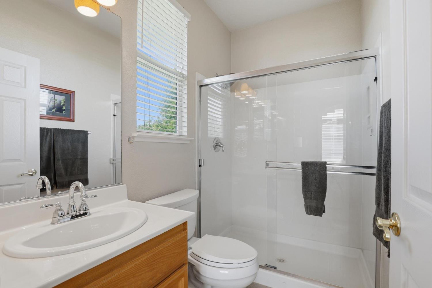 502 Waterfowl Way Williams, CA 95987 - Photo 14 of 51 a bathroom with a sink toilet and shower