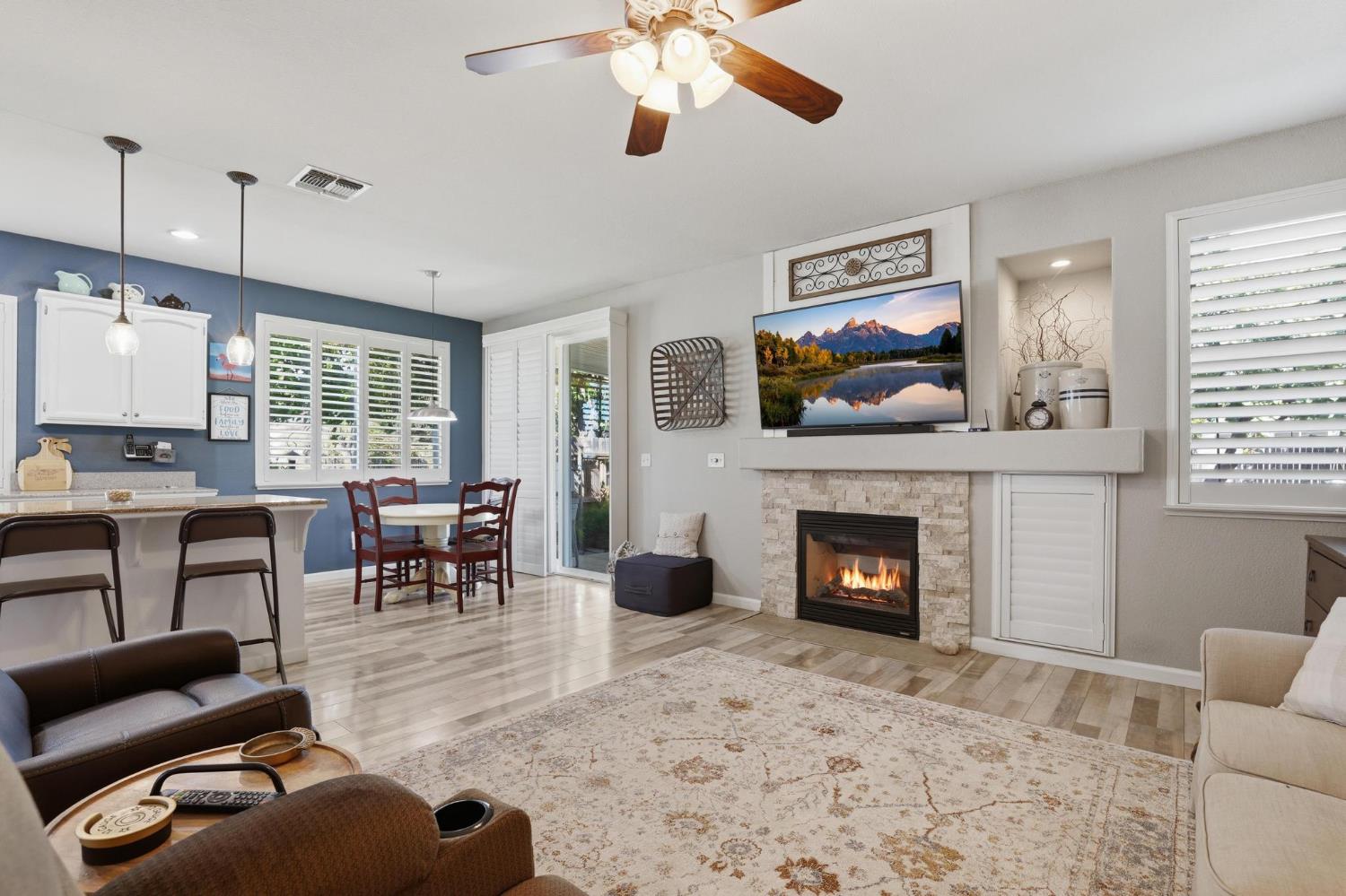 502 Waterfowl Way Williams, CA 95987 - Photo 15 of 51 a living room with furniture ceiling fan and a fireplace