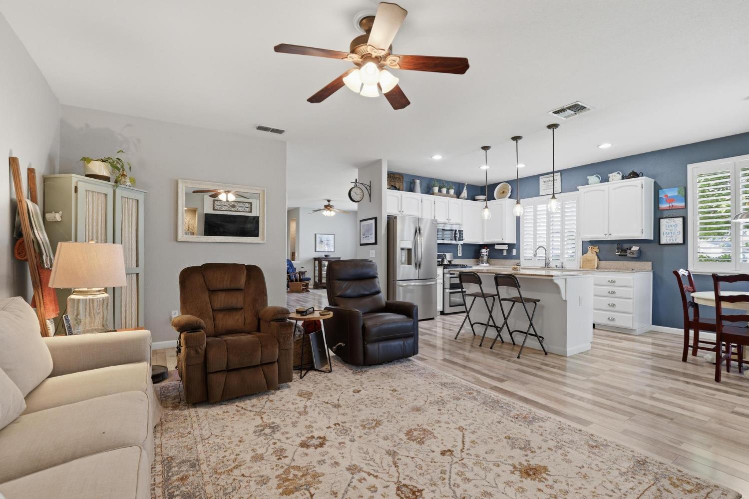 502 Waterfowl Way Williams, CA 95987 - Photo 16 of 51 a living room with furniture kitchen view and a chandelier