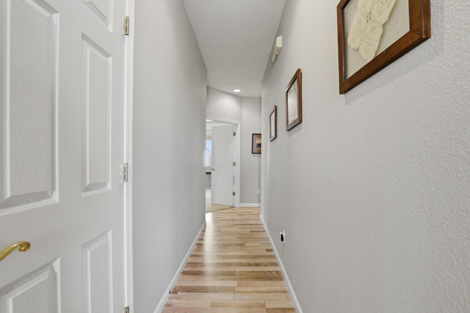 502 Waterfowl Way Williams, CA 95987 - Photo 23 of 51 a view of a hallway with wooden floor and staircase