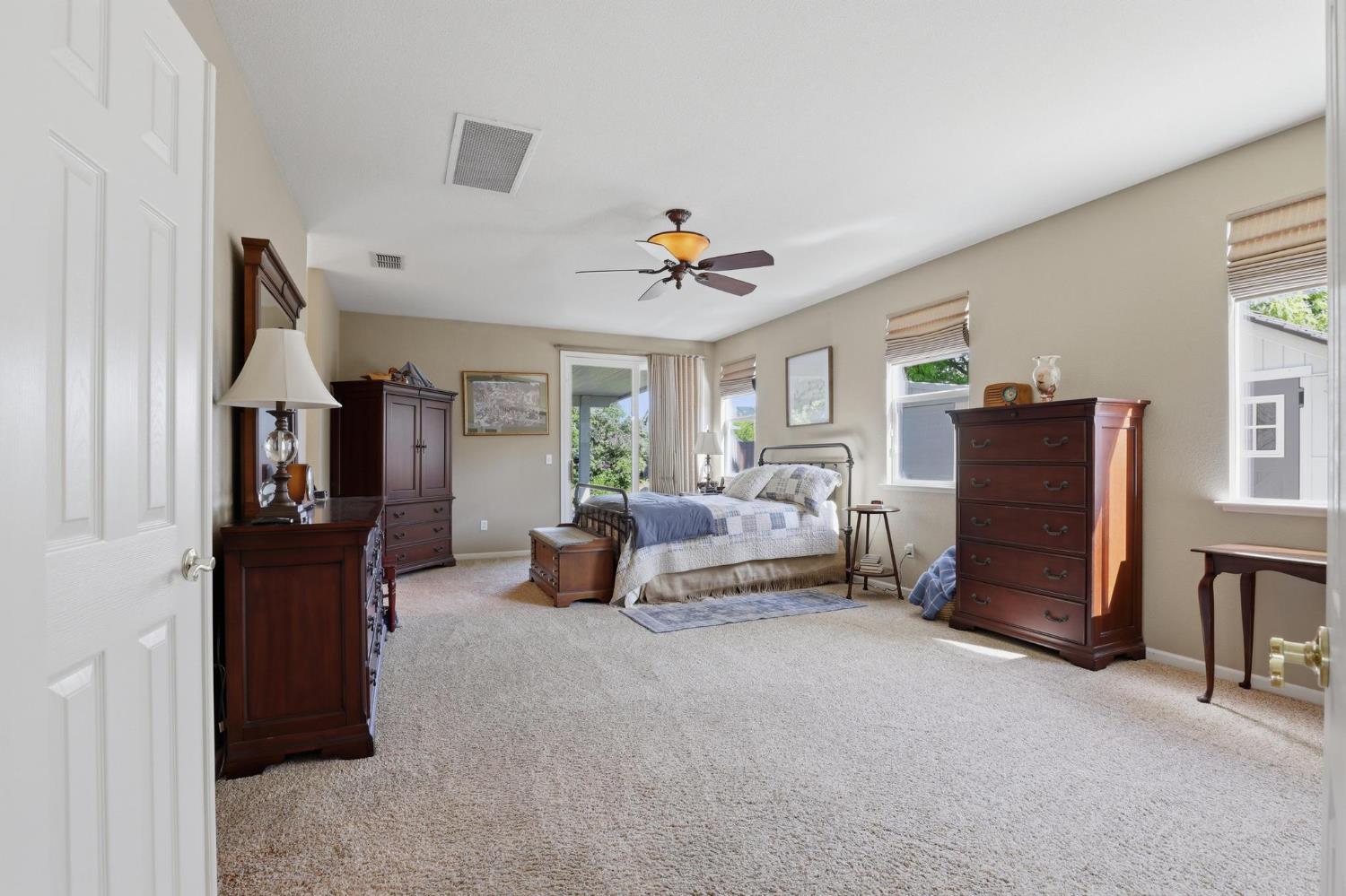 502 Waterfowl Way Williams, CA 95987 - Photo 24 of 51 a living room with furniture and a chandelier