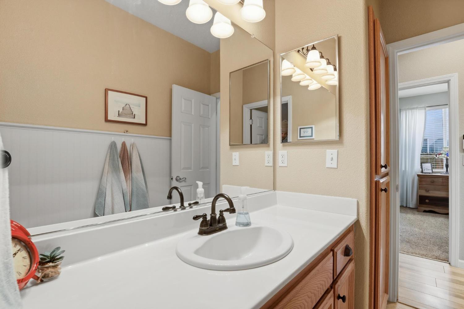 502 Waterfowl Way Williams, CA 95987 - Photo 34 of 51 a bathroom with a sink and a mirror