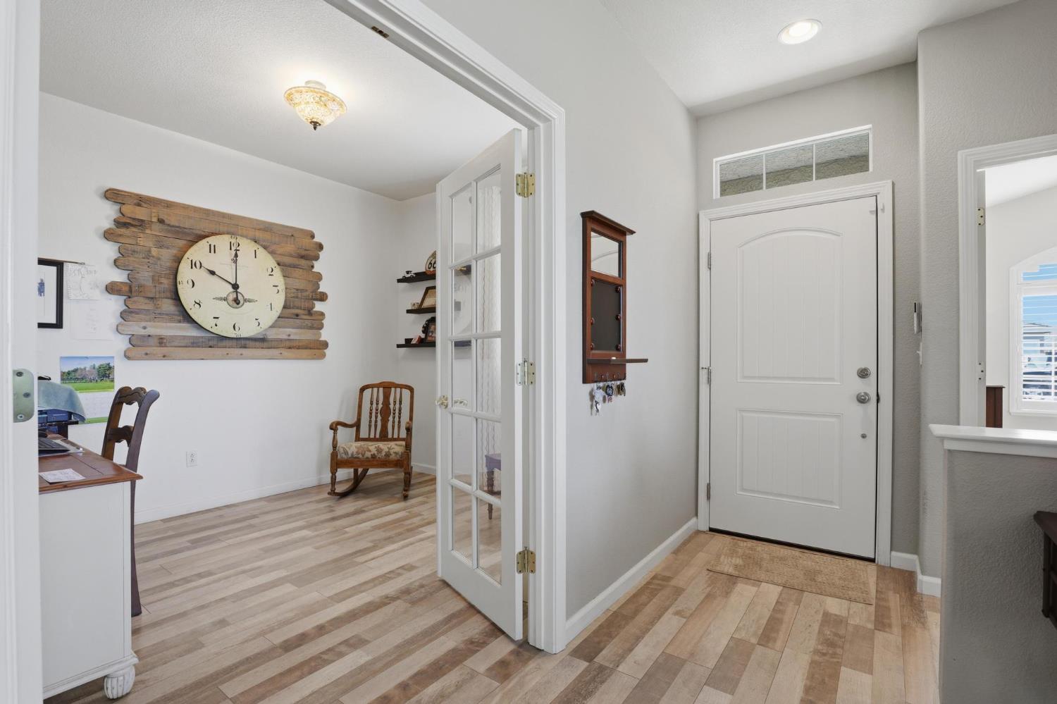 502 Waterfowl Way Williams, CA 95987 - Photo 6 of 51 a view of a hallway to rooms and wooden floor