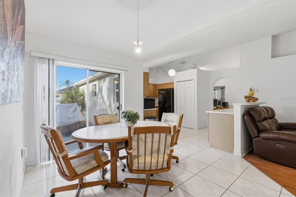 7172 Toledo Road Spring Hill, FL 34606 - Photo 23 of 38 a view of a dining room with furniture