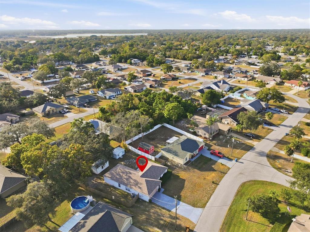 7172 Toledo Road Spring Hill, FL 34606 - Photo 34 of 38 an aerial view of residential houses with outdoor space