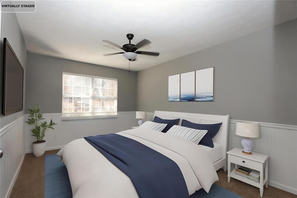 34 Clay Court Villa Rica, GA 30180 - Photo 10 of 15 a bedroom with a large bed and a window