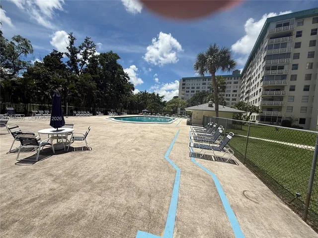 a view of a terrace with sitting area