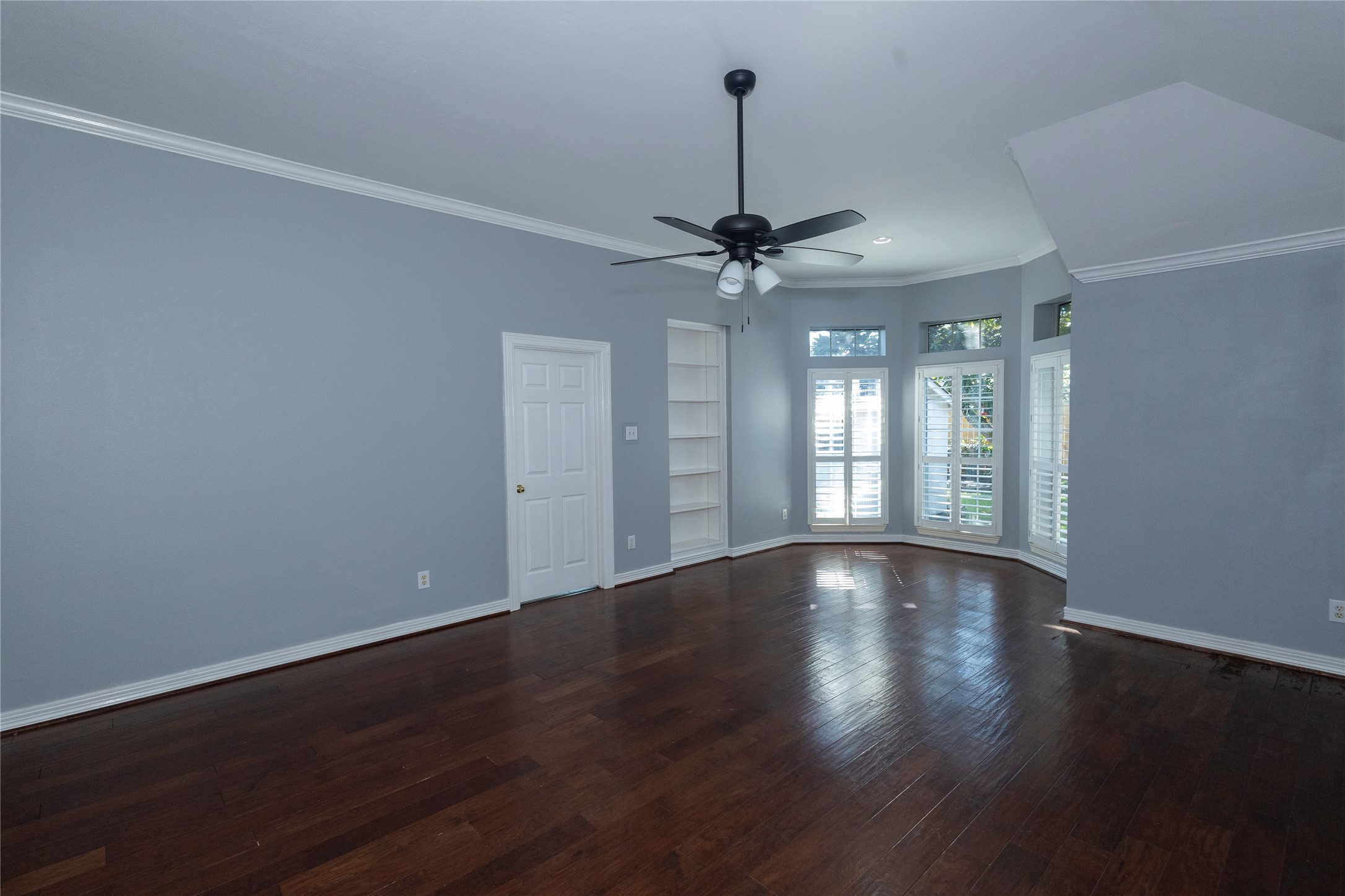 4402 Prince Pine Trail Houston, TX 77059 - Photo 13 of 23 a view of an empty room with wooden floor and a window
