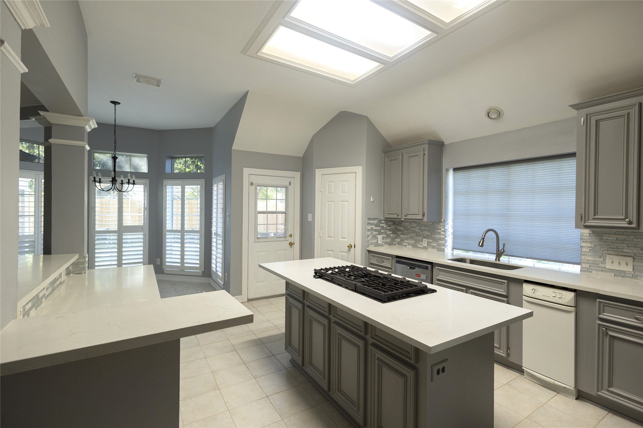 4402 Prince Pine Trail Houston, TX 77059 - Photo 8 of 23 a kitchen that has a sink and a stove in it