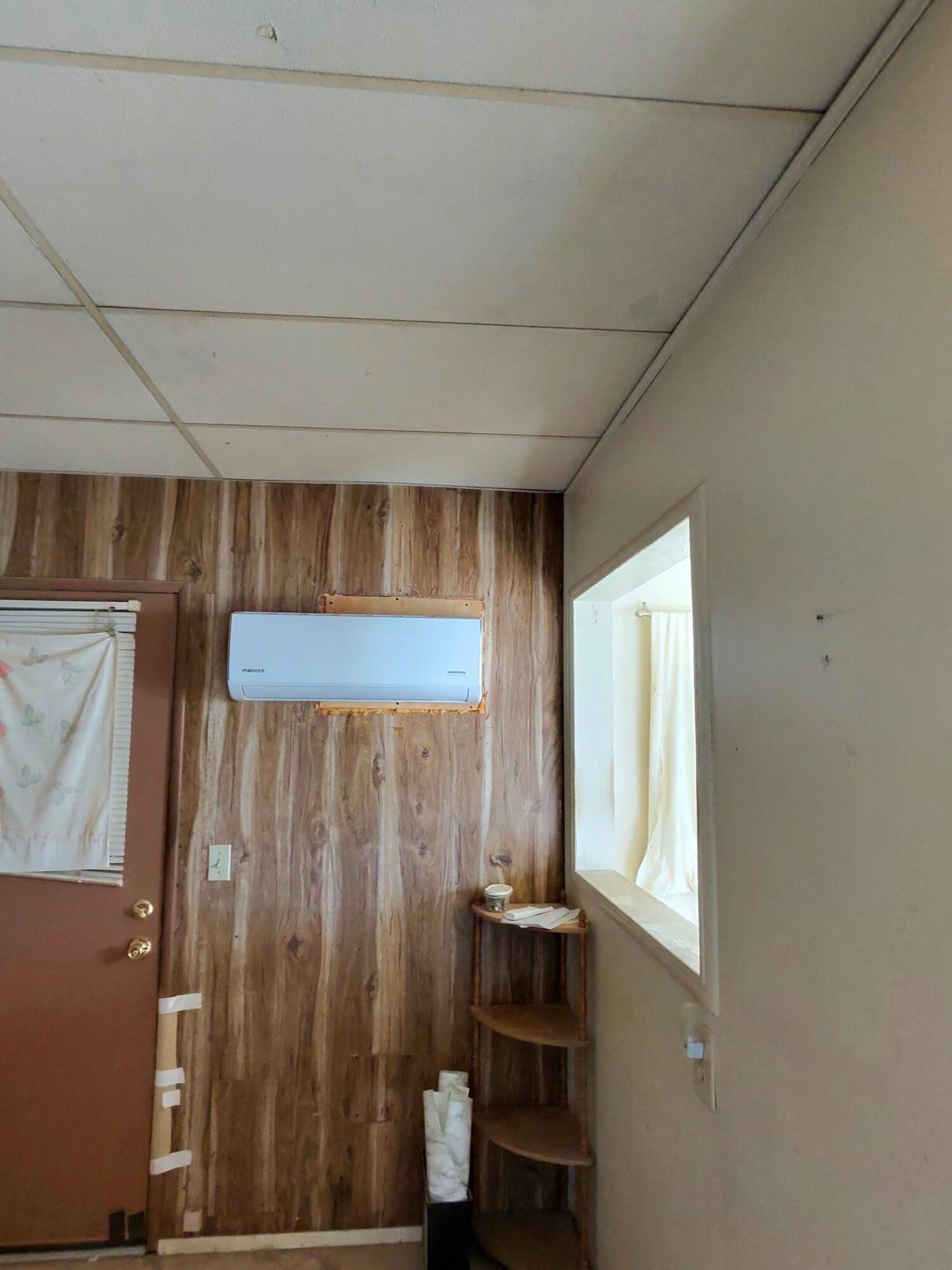 64625 Sonora Road Joshua Tree, CA 92252 - Photo 11 of 17 a view of wooden floor and chair in a room