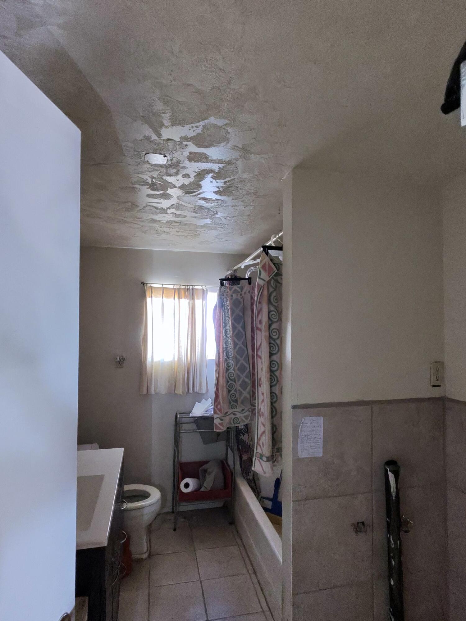 64625 Sonora Road Joshua Tree, CA 92252 - Photo 14 of 17 a bathroom with a toilet sink and shower