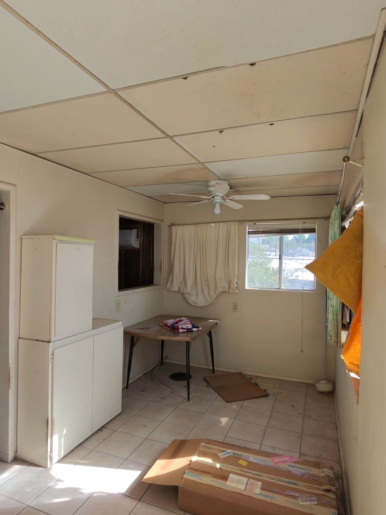 64625 Sonora Road Joshua Tree, CA 92252 - Photo 8 of 17 a room with furniture and a window