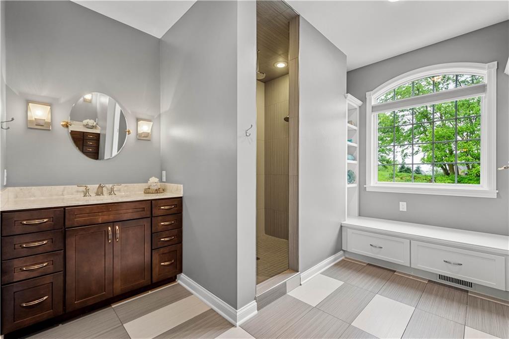 1272 McEwen Road Canonsburg, PA 15317 - Photo 21 of 50 A spa-like ensuite featuring dual vanities, a rainshower, and a massive walk-in closet.