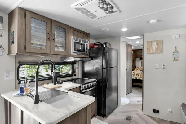 a living room with furniture and a table