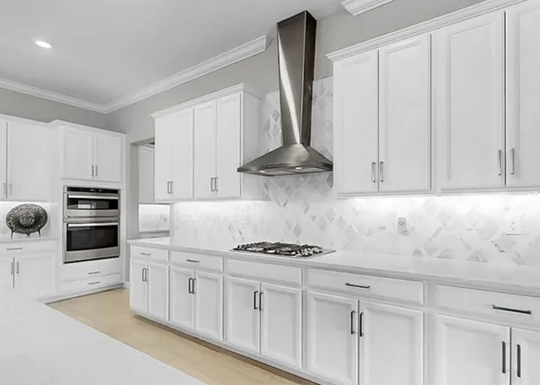 a kitchen with stainless steel appliances kitchen island stainless steel appliances a sink and cabinets