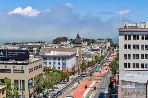 a view of a city that has tall buildings