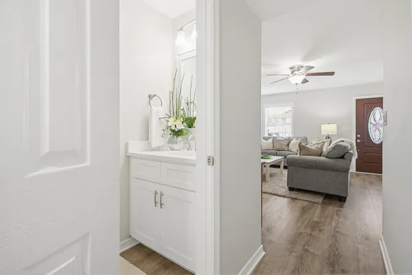 a kitchen with a sink stove and microwave