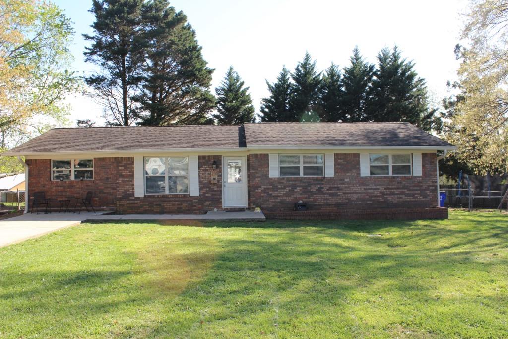 231 Blue Ridge Street Alto, GA 30510 - Photo 1 of 1 a view of a house with a yard and trees