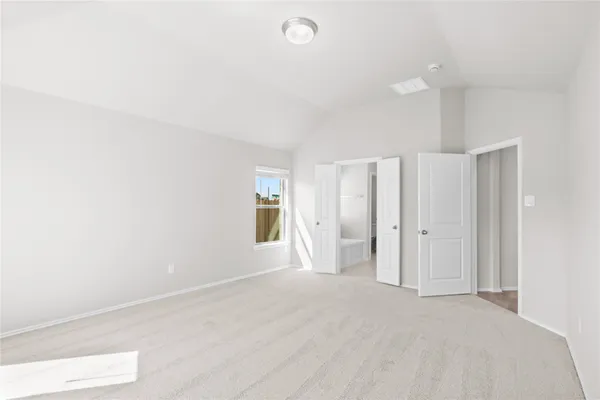 a kitchen with stainless steel appliances granite countertop a sink a stove a refrigerator and island