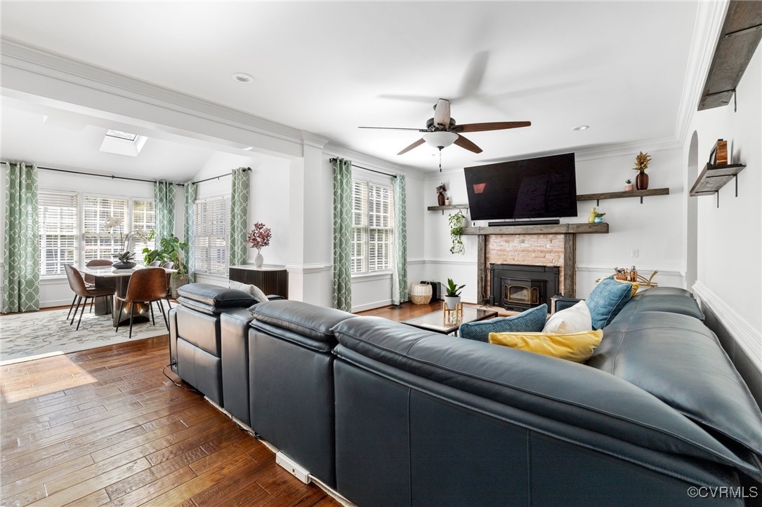 3813 Hackamore Lane Henrico, VA 23233 - Photo 13 of 45 a living room with furniture a fireplace and a flat screen tv