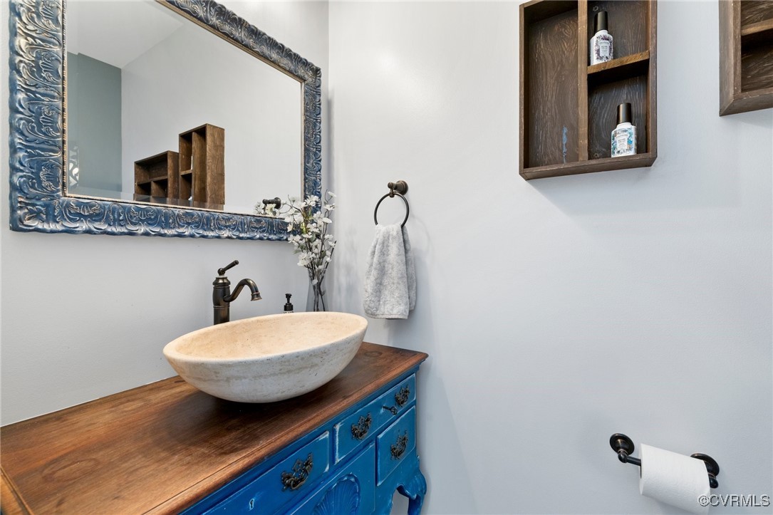 3813 Hackamore Lane Henrico, VA 23233 - Photo 21 of 45 a bathroom with a sink and a mirror