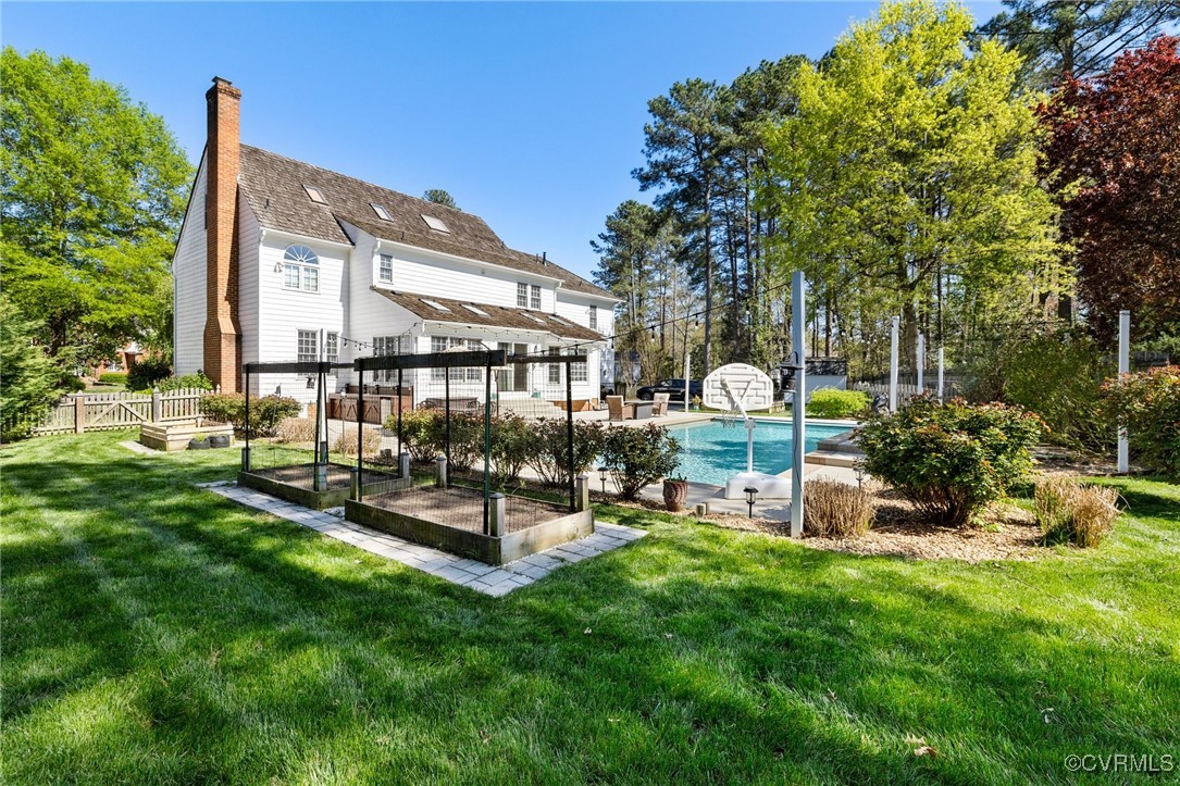 3813 Hackamore Lane Henrico, VA 23233 - Photo 43 of 45 a view of a chairs and table in a yard