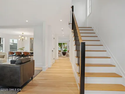 a view of a living room and entryway