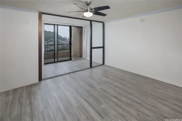 a view of an empty room with a window