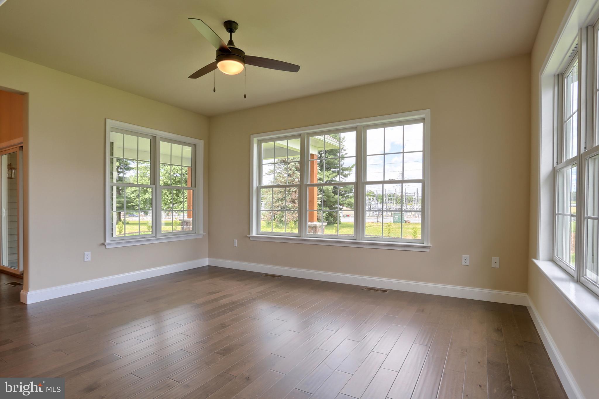 22 Rolling Meadow Road Lebanon, PA 17046 - Photo 15 of 38 a view of an empty room with wooden floor and a window