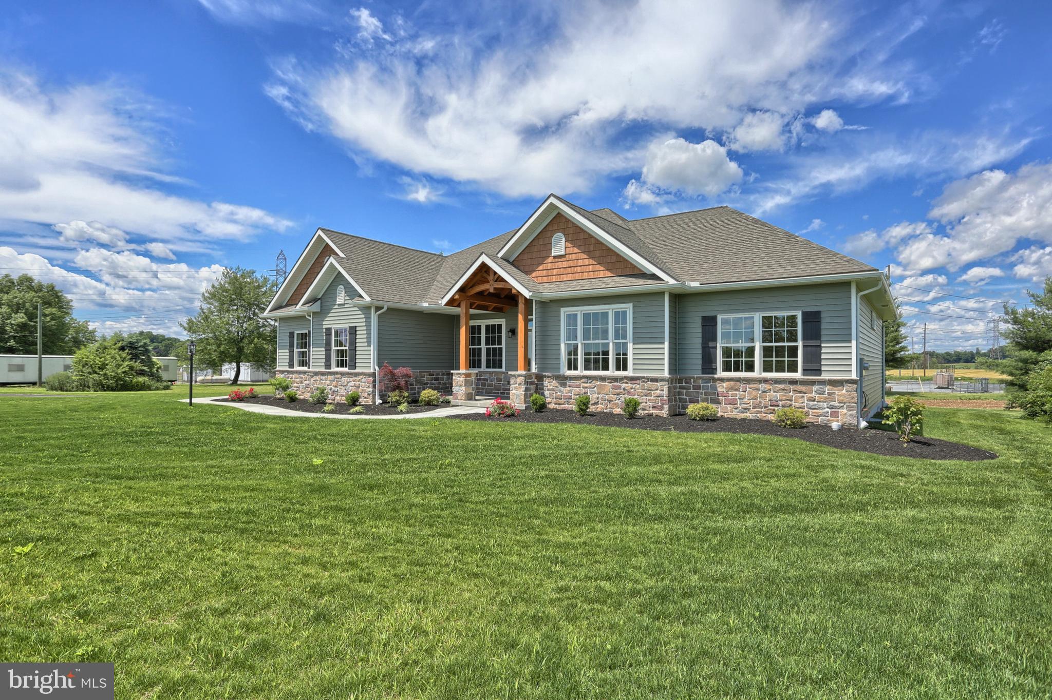 22 Rolling Meadow Road Lebanon, PA 17046 - Photo 2 of 38 a front view of a house with a garden