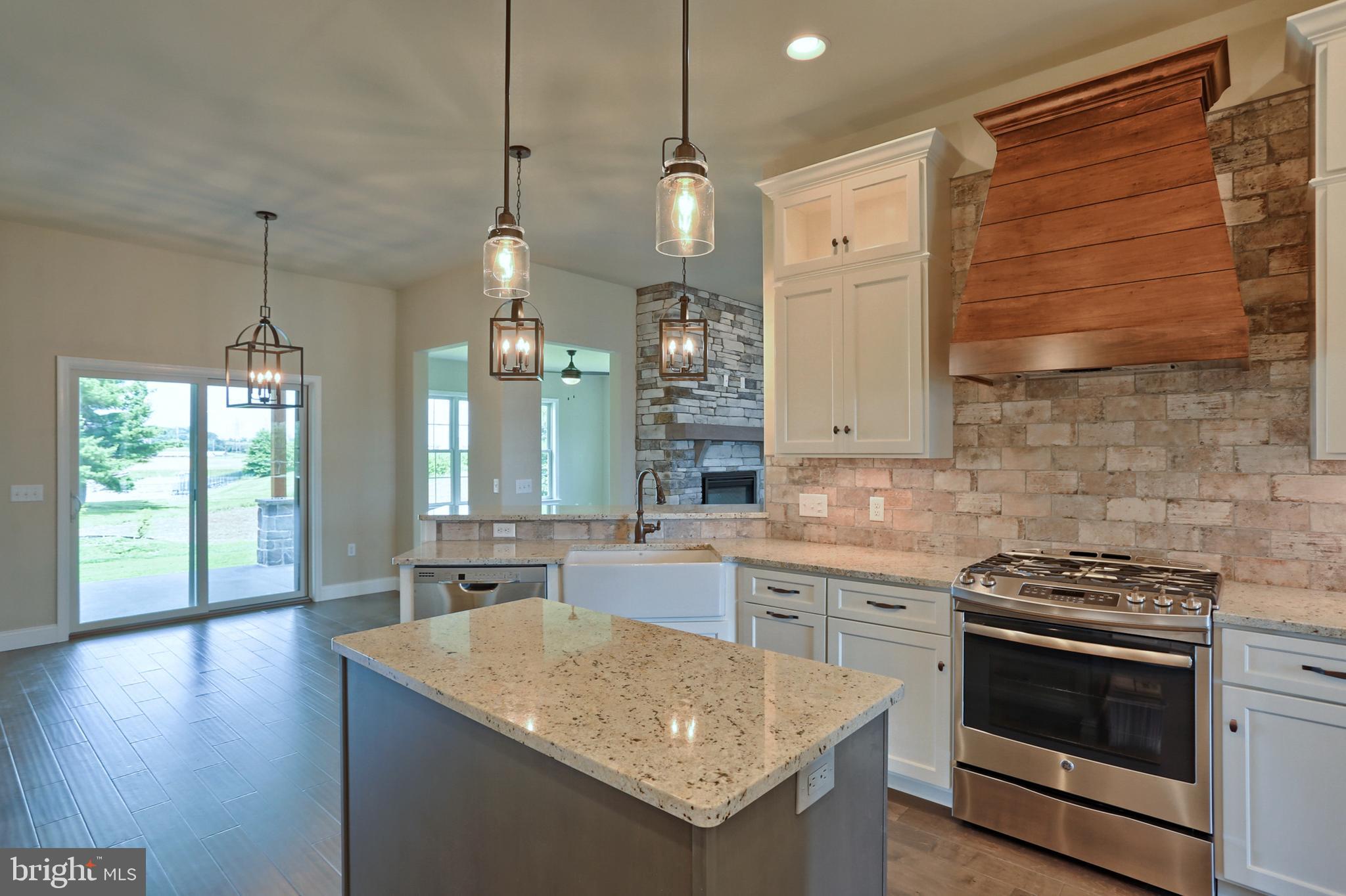 22 Rolling Meadow Road Lebanon, PA 17046 - Photo 21 of 38 a kitchen with a stove sink and cabinets