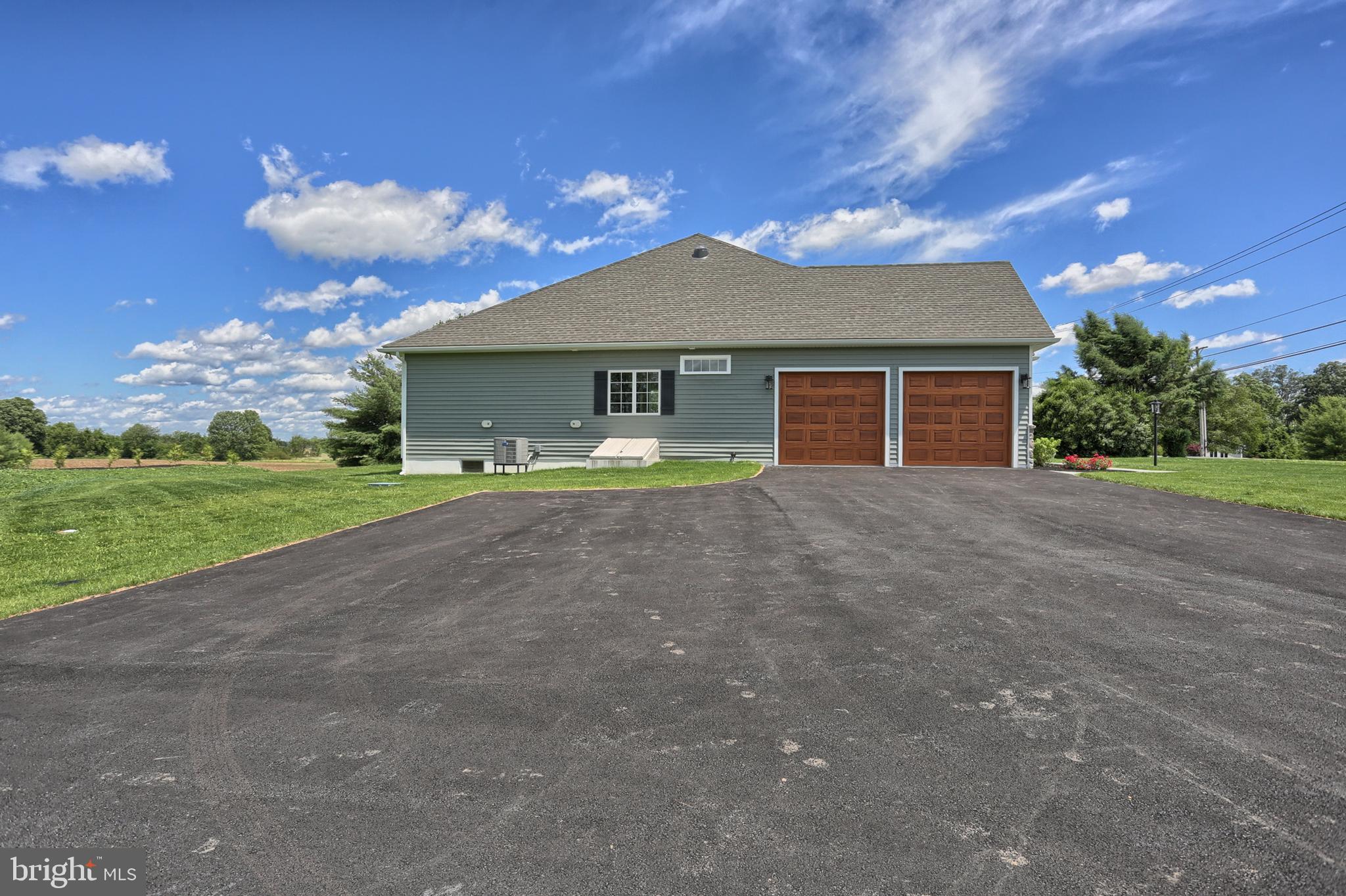 22 Rolling Meadow Road Lebanon, PA 17046 - Photo 6 of 38 a view of a house with backyard and a garden