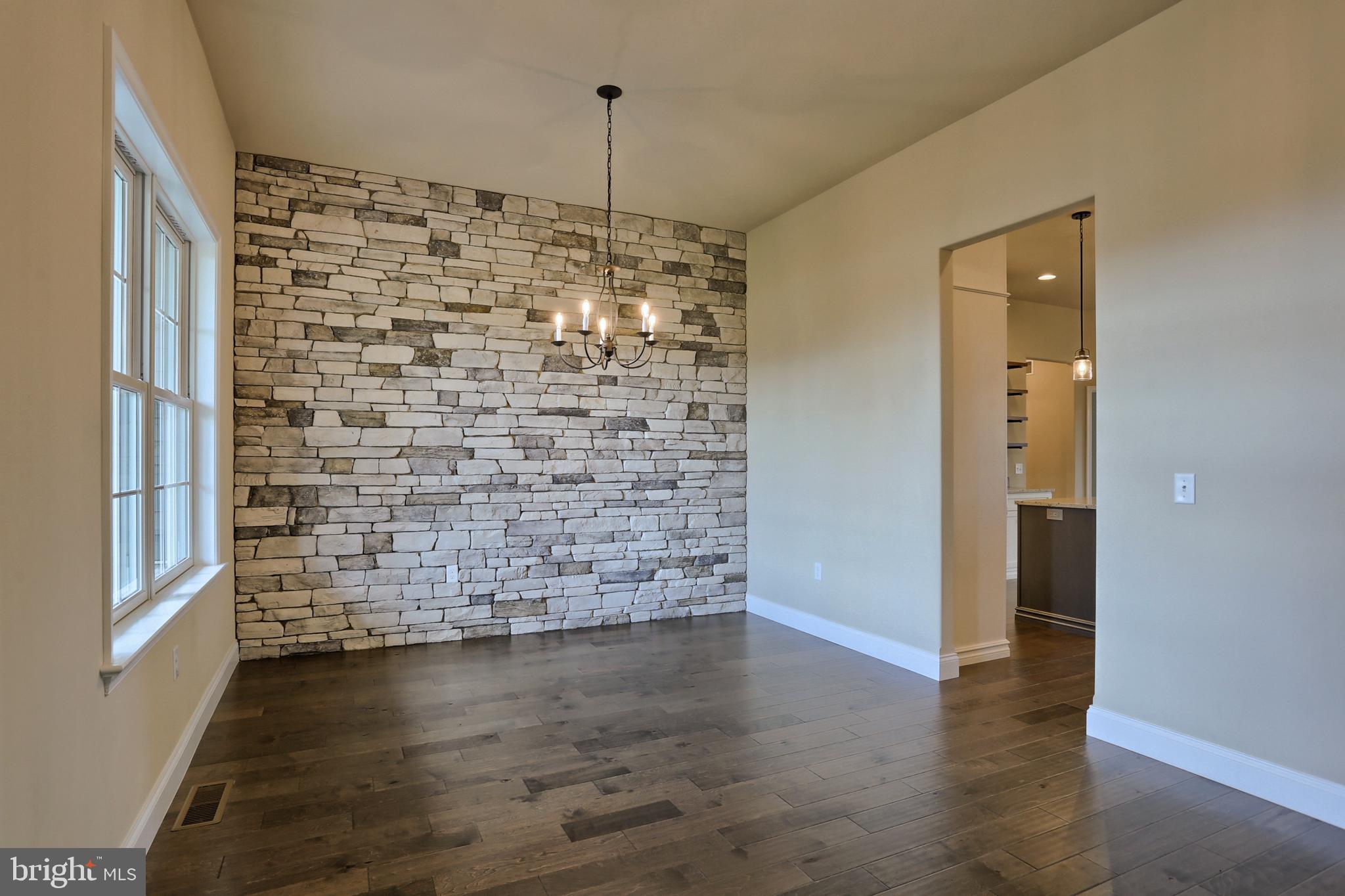 22 Rolling Meadow Road Lebanon, PA 17046 - Photo 9 of 38 a room with hard wood floors and a chandelier