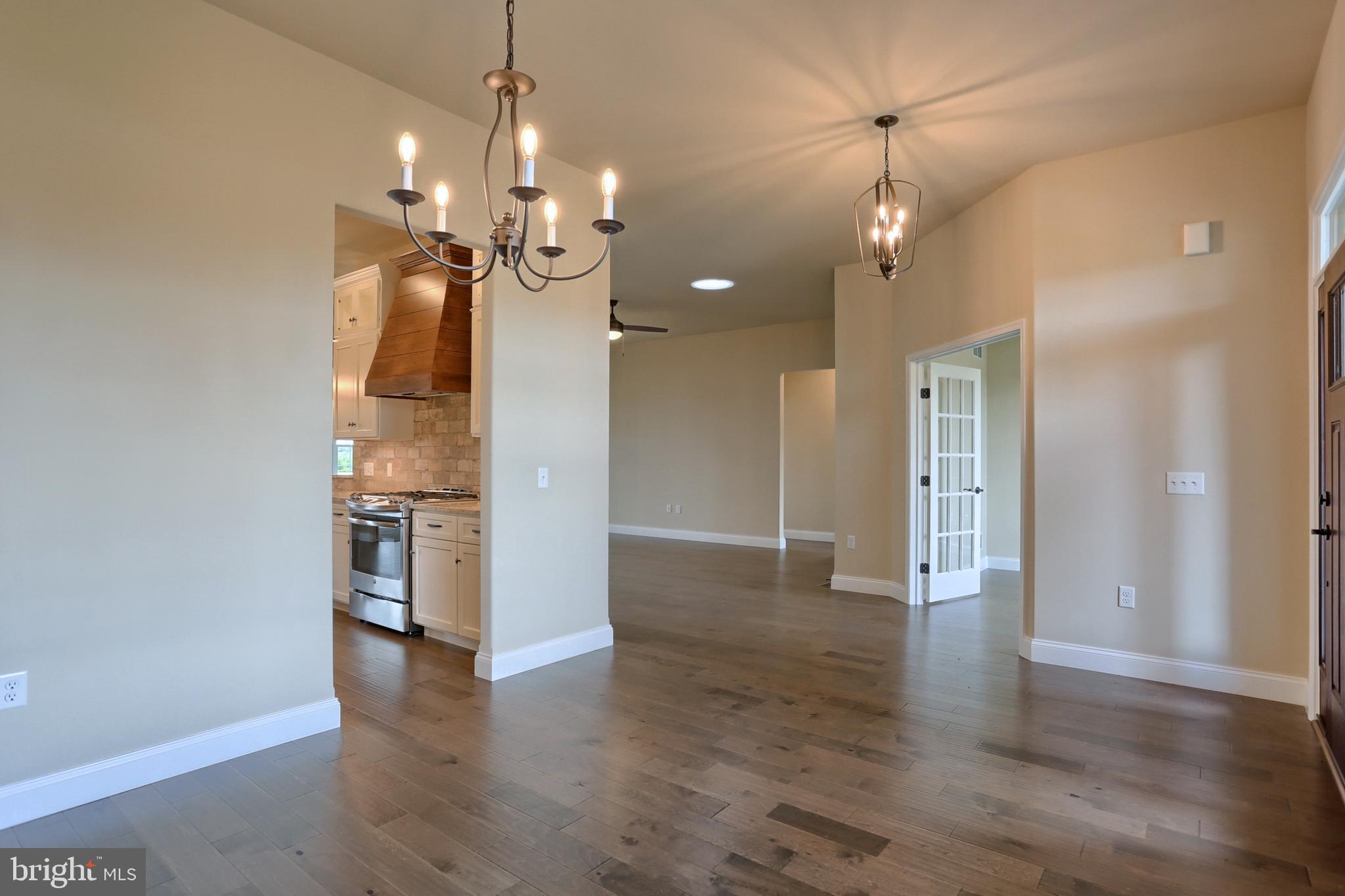 22 Rolling Meadow Road Lebanon, PA 17046 - Photo 10 of 38 a view of a room with wooden floor and a ceiling fan