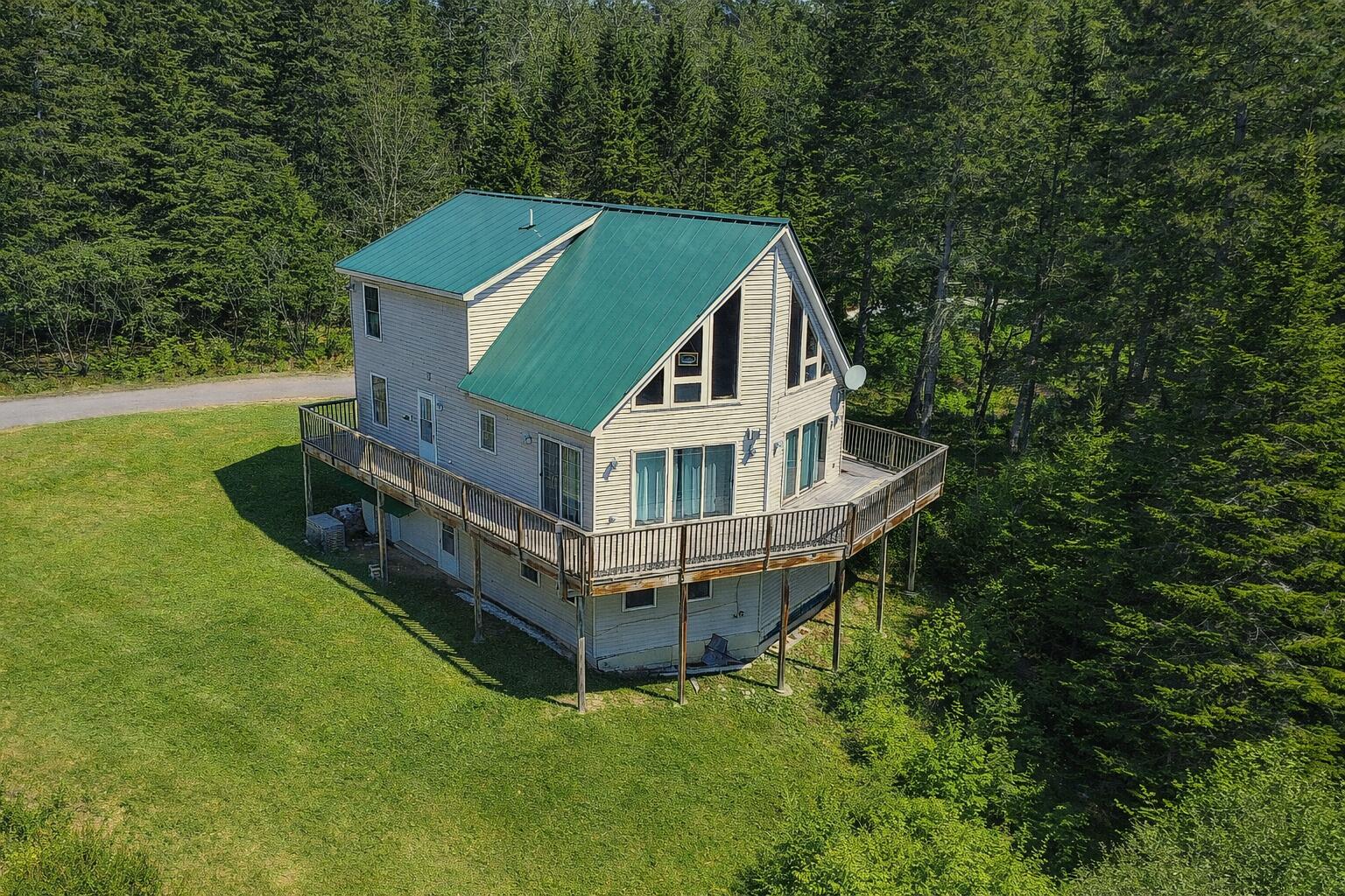 49 Field Way Rangeley, ME 04970 - Photo 2 of 60 photo with enhanced grass