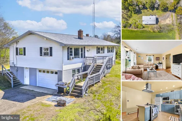 a view of a house with backyard