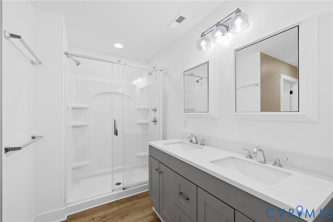 11905 Quaker Road Dinwiddie, VA 23841 - Photo 22 of 34 Dual vanity with integrated sinks, framed mirrors,