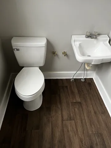 a view of a room with rack and tub