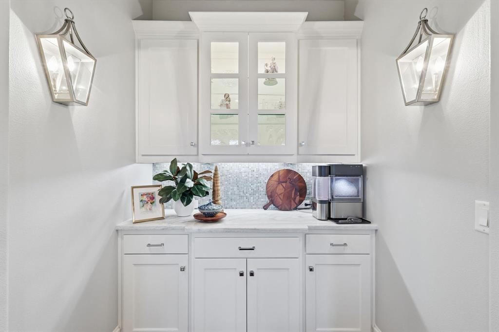 921 Winding Ridge Trail Southlake, TX 76092 - Photo 11 of 40 a bathroom with a sink and a mirror