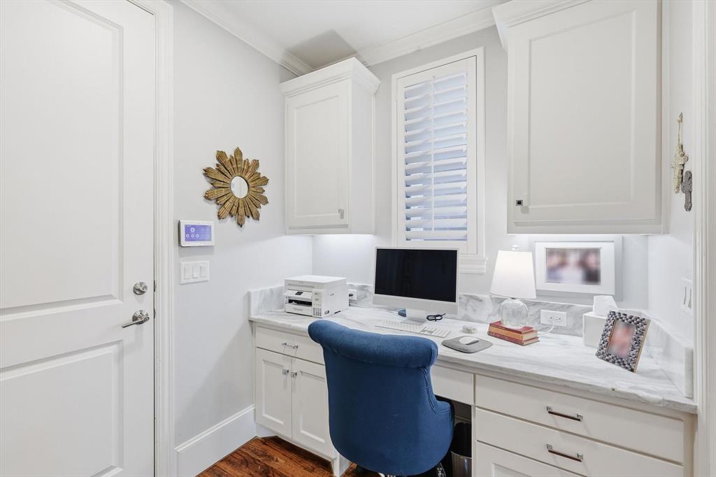 921 Winding Ridge Trail Southlake, TX 76092 - Photo 12 of 40 a workspace with a computer on a desk and a chair