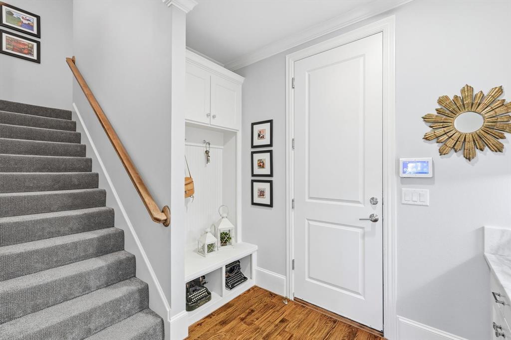 921 Winding Ridge Trail Southlake, TX 76092 - Photo 13 of 40 a view of entryway and hall with wooden floor