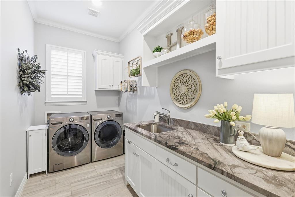 921 Winding Ridge Trail Southlake, TX 76092 - Photo 14 of 40 a view with a washer and dryer